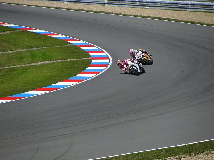 Motorbike Racing vs. Car Racing - Superbike or Formula One? Image